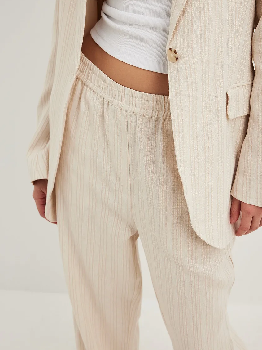 מכנסי פסים רחבים בשילוב פשתן