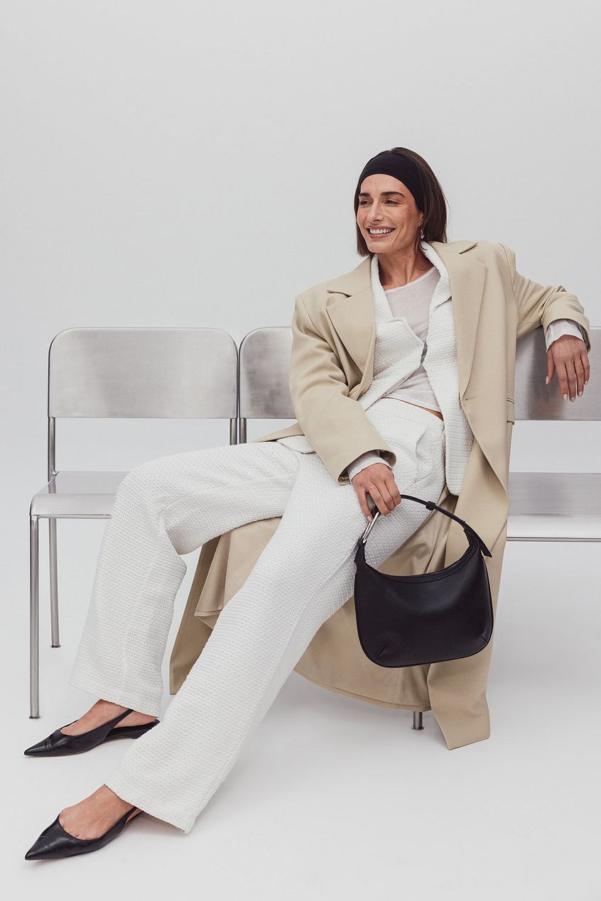 מכנסי טוויד בגזרה ישרה ובמותן גבוהה