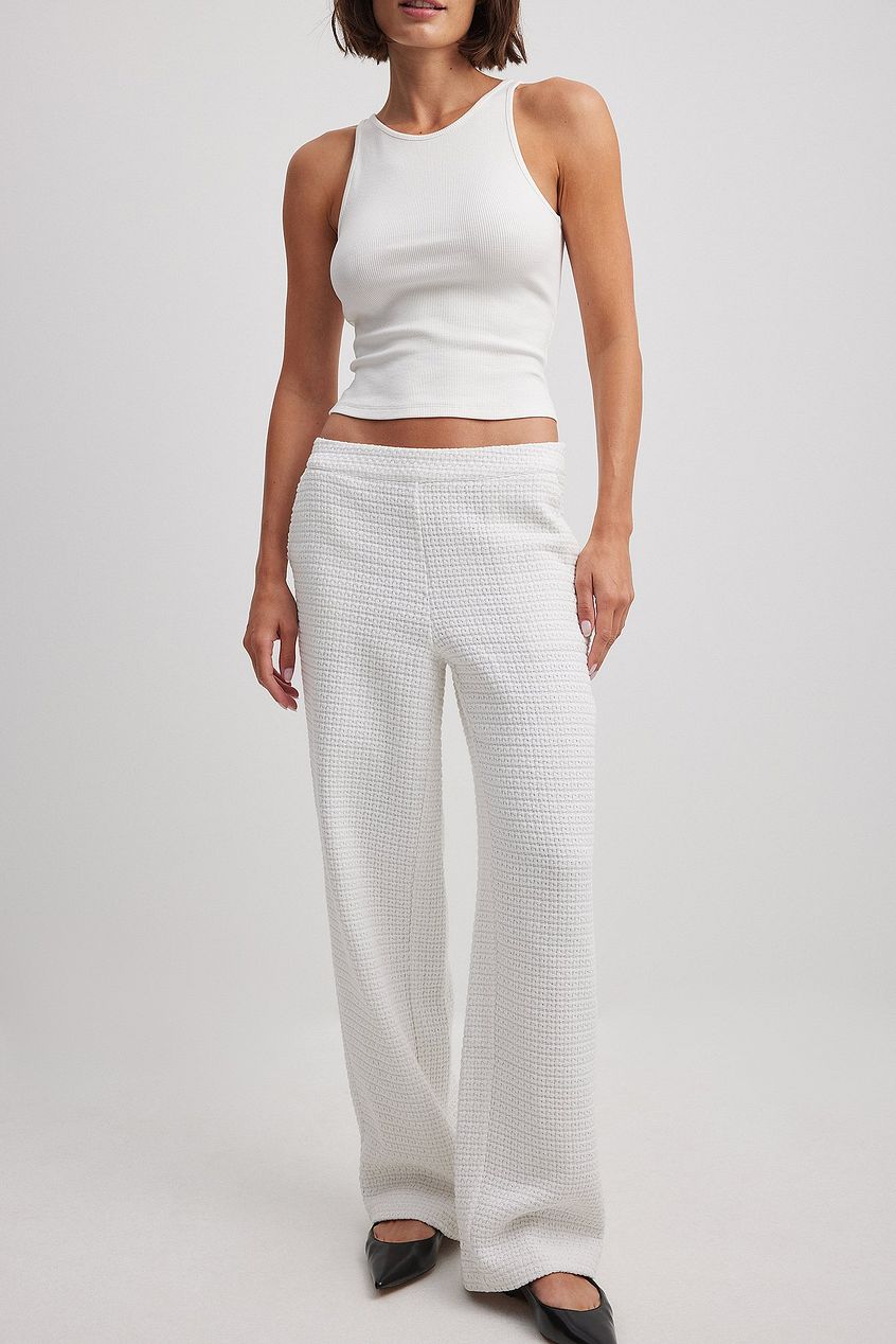 מכנסי טוויד בגזרה ישרה ובמותן גבוהה