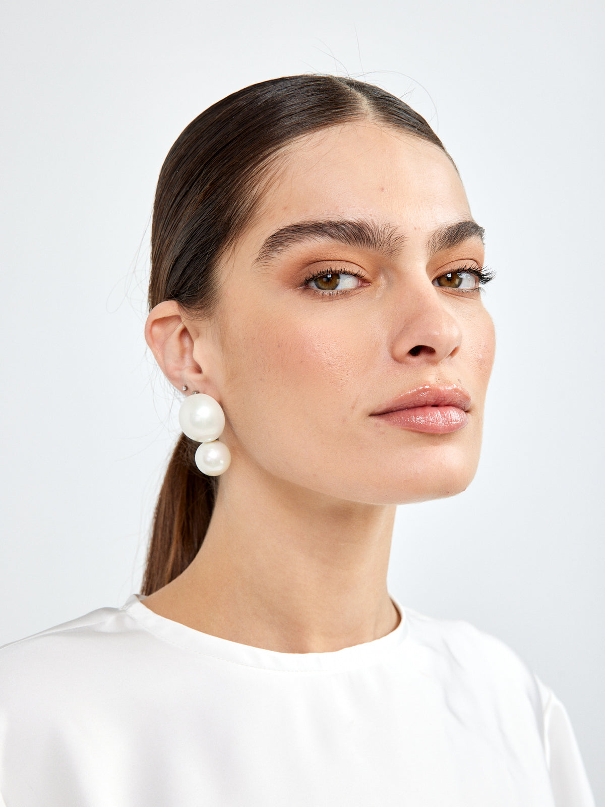 עגילי פנינים / נשים