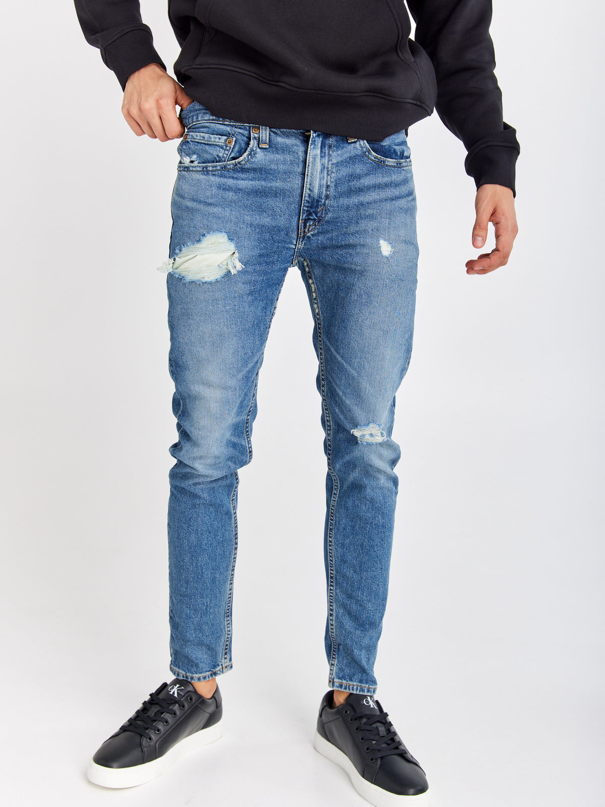 מכנסי סקיני ג'ינס 519 עם שפשופים